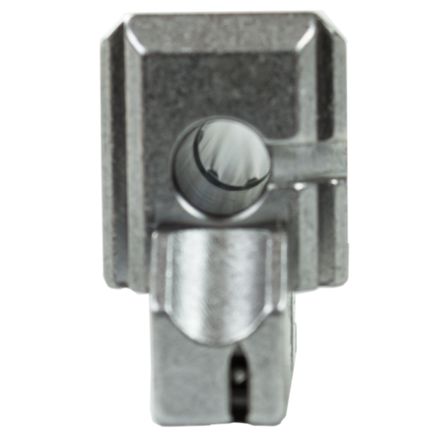 Close-up image of a metallic, machined part similar to the THREADED BARREL SP-01 KADET 22LR, featuring a square shape and central cylindrical hole. The brushed metal texture is enhanced by the threaded barrel-like opening at the bottom, which reveals an i