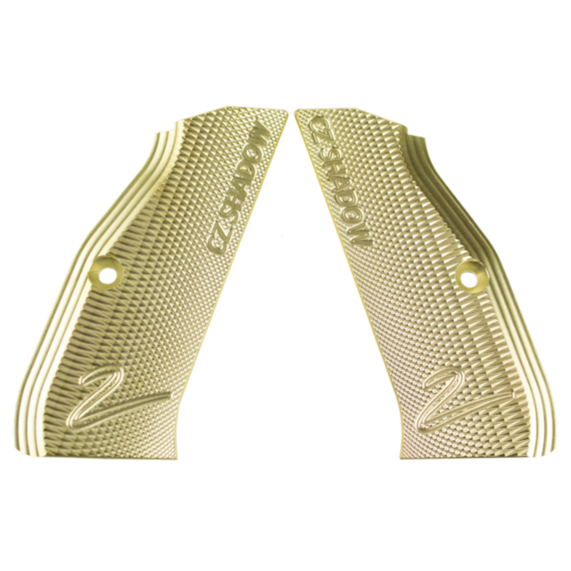 The BRASS GRIPS LONG SHADOW 2 CZUB are a pair of textured brass grips with a metallic gold finish, featuring the engraved text "CZ SHADOW" and the number "2." These grips, designed by CZUB, showcase a raised patterned surface with attachment holes and are