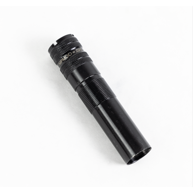 The 1012 IM Choke, a black cylindrical flashlight featuring a textured grip and engraved markings, is positioned on a white surface, viewed at an angle.