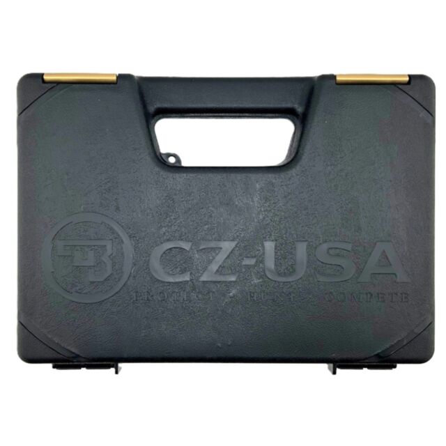 A genuine CZ-USA factory case (Product 18995): black hard plastic with a handle, gold-colored hinges, and the "CZ-USA" logo embossed on the front.