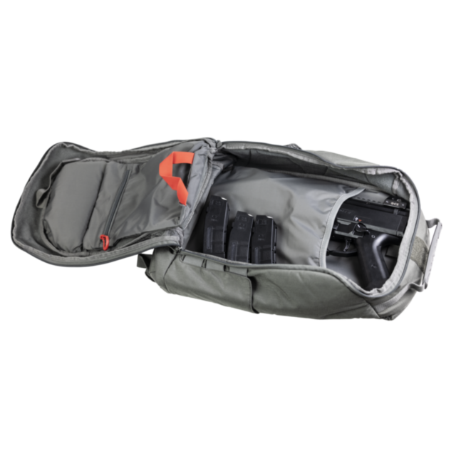 Open the CZ Legion Scorpion Tactical Backpack by Cannae in grey nylon, featuring orange trim details, to reveal a handgun and three magazines inside, positioned on the right side of the light grey inner compartment.
