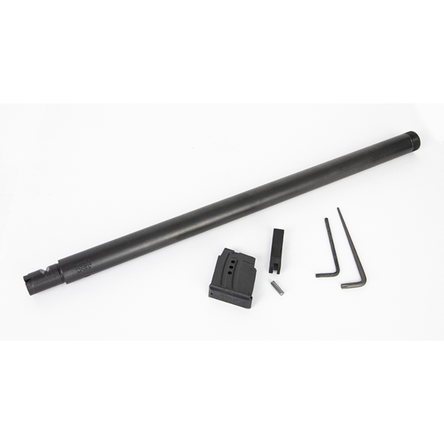 The CZ 457 MTR SR Barrel Set, 22LR 16.5in Nitride, is a sleek black cylindrical rifle barrel presented alongside various gun components, including a magazine, two hex keys, and assorted small parts, all carefully arranged on a pristine white background.