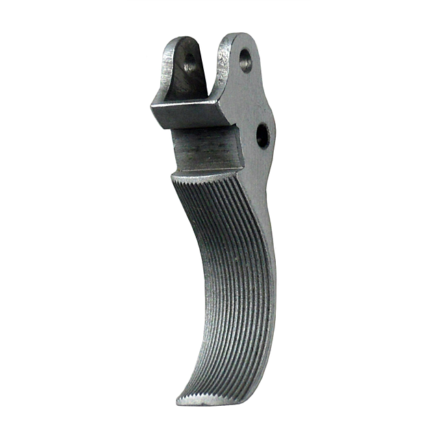 A close-up image of the TRIGGER PCR SERRATED, showcasing its metallic, curved design with serrated features. The trigger includes grooves for enhanced grip and a hole near the top for easy attachment. Its silver color is emphasized against a white backgro