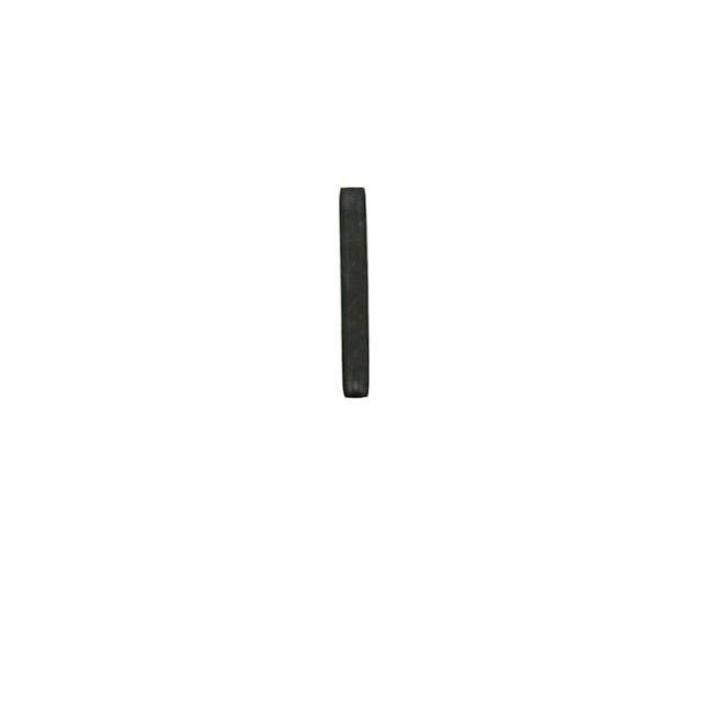 A tall, thin, dark gray rectangular object, resembling the sleek design of a FRONT INSERT PIN P-07/P-09 AND PHANTOM TRIGGER PIN, stands upright on a plain white background, casting a faint shadow.