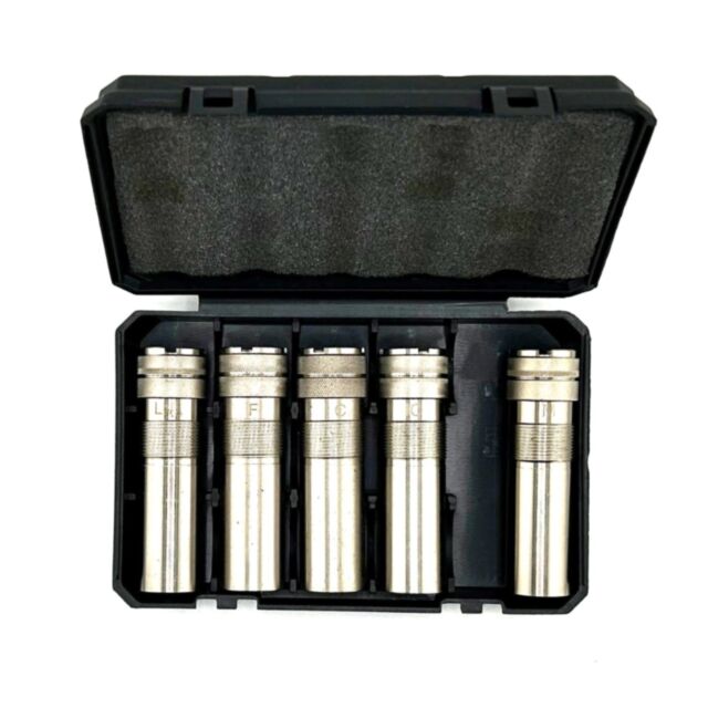 The Ext. Choke set 12ga Trap MC-5 (F-M-LM-IC-C) for 612 Target comes in a black plastic case with foam lining, holding five labeled metallic chokes, each in its own slot.