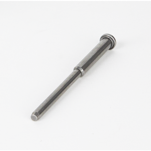 A RECOIL SPRING GUIDE STEEL CZUB TS lies on a white surface. It is cylindrical with a small flange on one end and a smooth, polished finish, resembling the precision found in CZUB TS components.