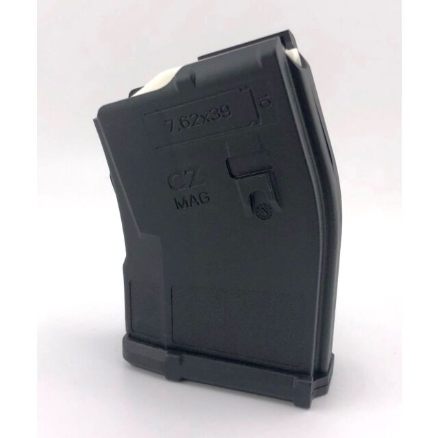 A black CZ MAG BREN 2/600 TRAIL 762X39 magazine with a capacity of 10 rounds stands upright against a white background. It has a slightly curved design and features text indicating its caliber and brand.