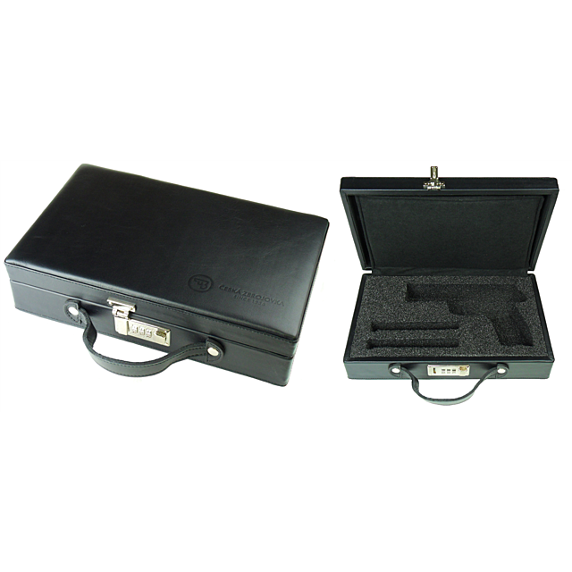 The CZ FACTORY LEATHER CASE WITH COMBO LOCK is presented here in black leather, featuring a sturdy handle. Displayed closed on the left and open on the right, its interior is crafted with precision to include foam cutouts perfectly shaped for a handgun an