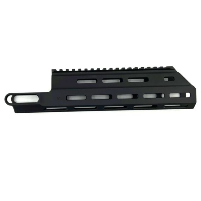 The BREN 2 MS Carbine US Hand Guard, a black metal accessory with rectangular cutouts and a top rail, is displayed against a white background.
