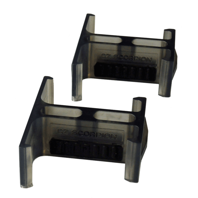 Two CZ Scorpion Magazine Couplers made of plastic are displayed. They are transparent, with a dark central section featuring "CZ Scorpion" text on each. These couplers sit against a plain background, emphasizing their sleek design and functionality.