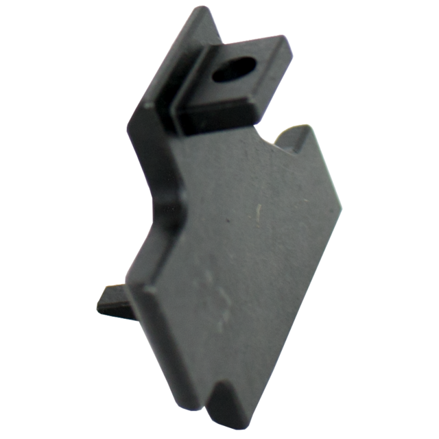 A close-up image of the BOLT RELEASE 805 features a black plastic panel with a protruding tab that includes a small hole. The panel, crafted for bolt release functions, showcases ridged edges and an angular design. Its intricate shape and features are hig