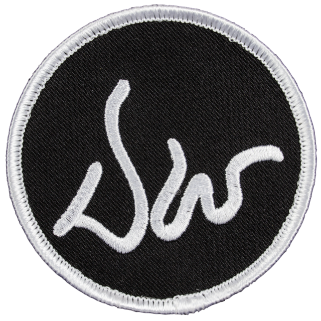 The DAN WESSON 3" PATCH, BLACK features a stylized "SW" logo embroidered in white cursive script, set on a black circular background with a contrasting white border, evoking the elegance associated with Dan Wesson designs.