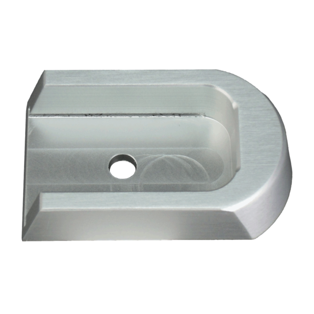The SILVER ALUMINUM 40P/SP-01 BASE PAD has a curved edge and a rectangular slot in the center, along with a circular hole for mounting. Its surface reflects light to showcase its smooth, brushed finish.