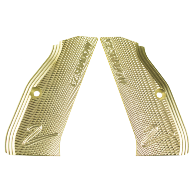 The BRASS GRIPS LONG SHADOW 2 CZUB are a pair of textured brass grips with a metallic gold finish, featuring the engraved text "CZ SHADOW" and the number "2." These grips, designed by CZUB, showcase a raised patterned surface with attachment holes and are
