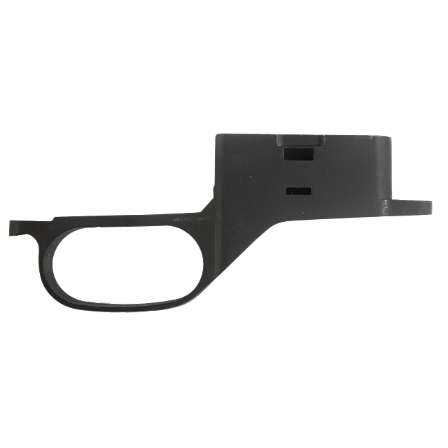 The TRIGGER GUARD CZ 527 .223/ .17 REM is a black metal accessory designed for CZ 527 firearms, featuring an opening for the trigger alongside additional rectangular cutouts. Its design boasts sharp angles and a matte finish, with the image highlighting i