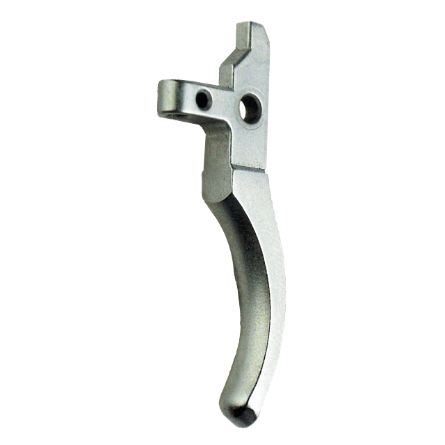 The 527/550 TRIGGER NEW STYLE is a silver component with an intricately shaped metal design, featuring a curved handle and an angular top. It includes two holes near the top and incorporates innovative elements that redefine functionality.