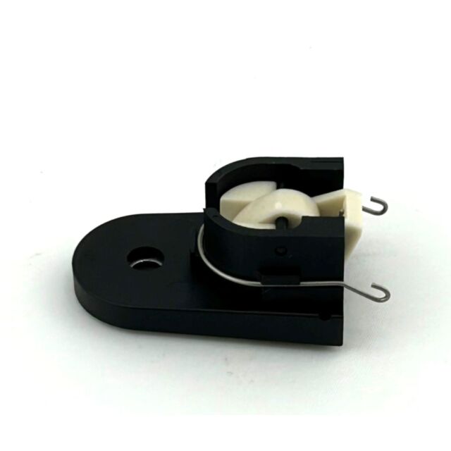 Magazine Catch CZ 600 featuring a black plastic mounting bracket, a white wheel-like component, and a metal wire clip, shown on a plain white background.