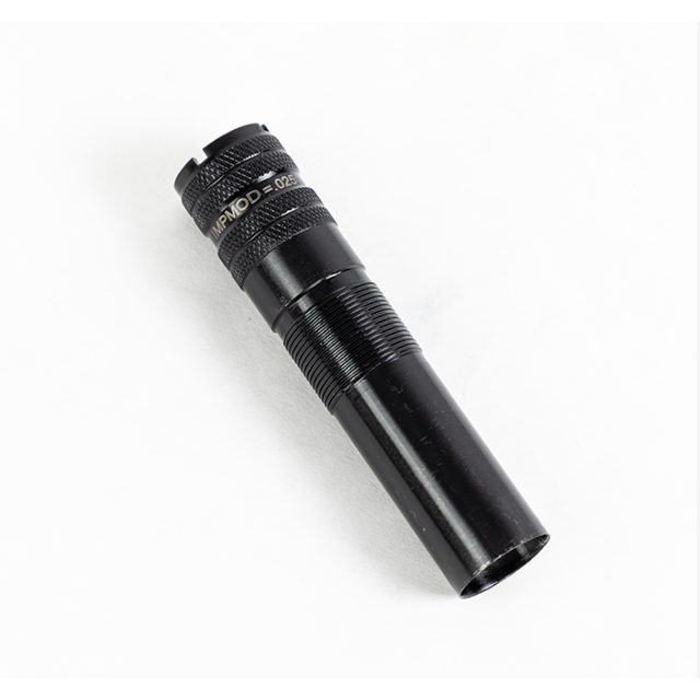 The 1012 IM Choke, a black cylindrical flashlight featuring a textured grip and engraved markings, is positioned on a white surface, viewed at an angle.