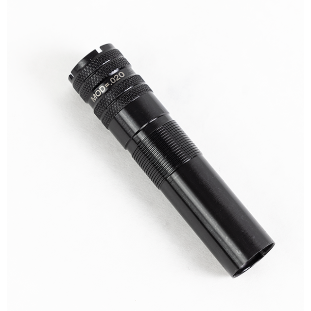 A black flashlight with a textured grip lies at an angle on a white surface, featuring the text "1012 M Choke" near the top.
