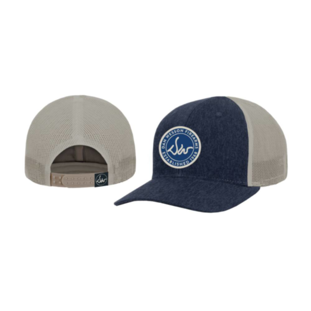Front and back views of the Dan Wesson Navy Trucker, featuring a blue denim-like front, beige mesh back, circular front logo patch, and adjustable snap closure.